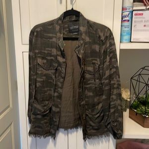 Woman’s sanctuary camouflage jacket